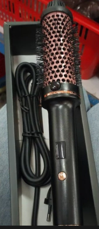 The All-in-One Hair Curler & Straightener